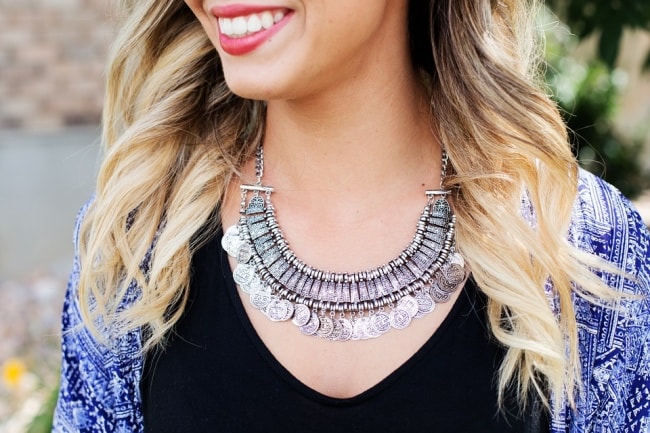 Heavy earrings and necklaces min